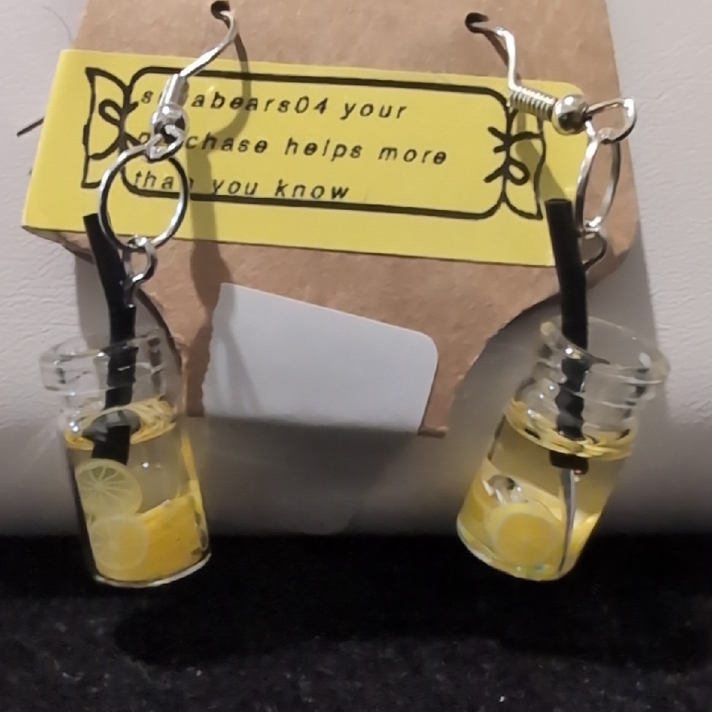 silver-tone dangle earrings featuring mini glass bottle charms filled with faux